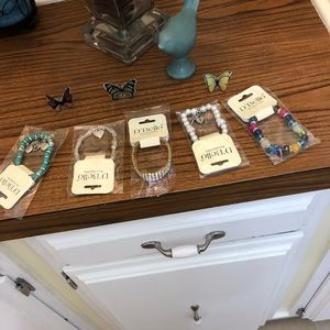 Bello brand bracelets; in sealed bags, never worn.